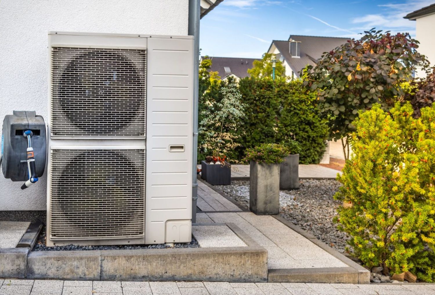 HVAC technician servicing an air conditioning unit